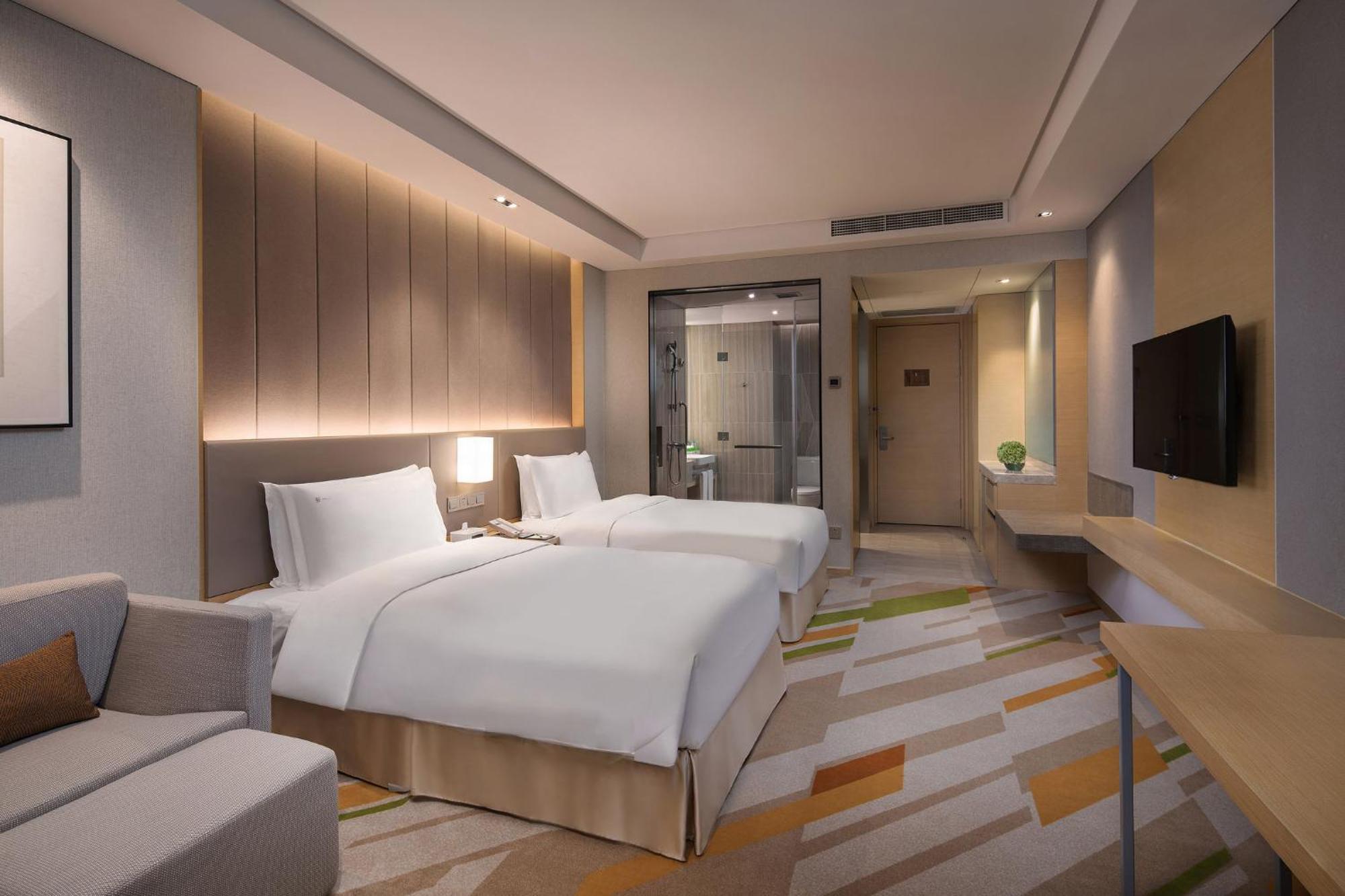 Holiday Inn Wuxi Taihu New City By Ihg מראה חיצוני תמונה