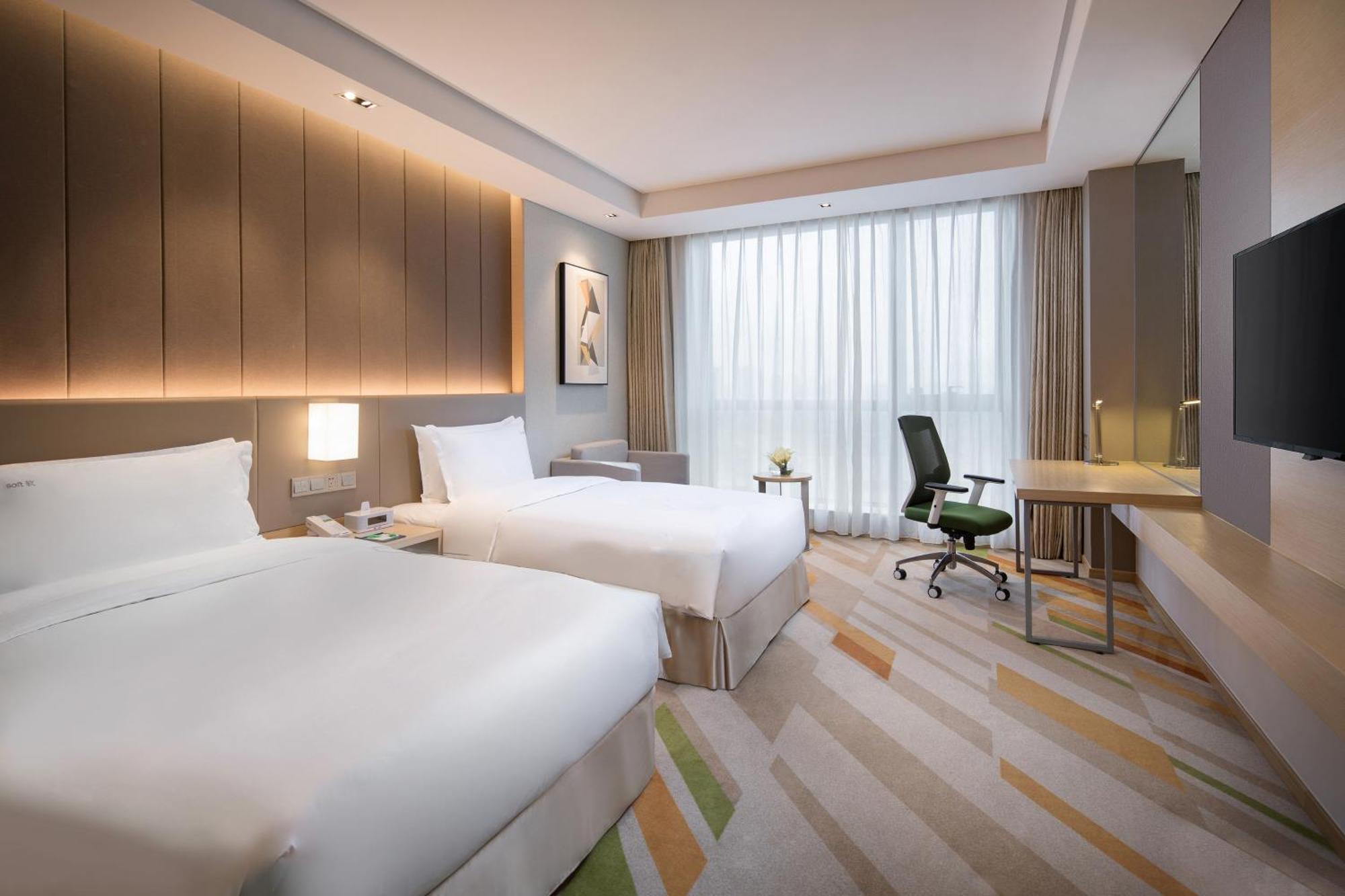 Holiday Inn Wuxi Taihu New City By Ihg מראה חיצוני תמונה