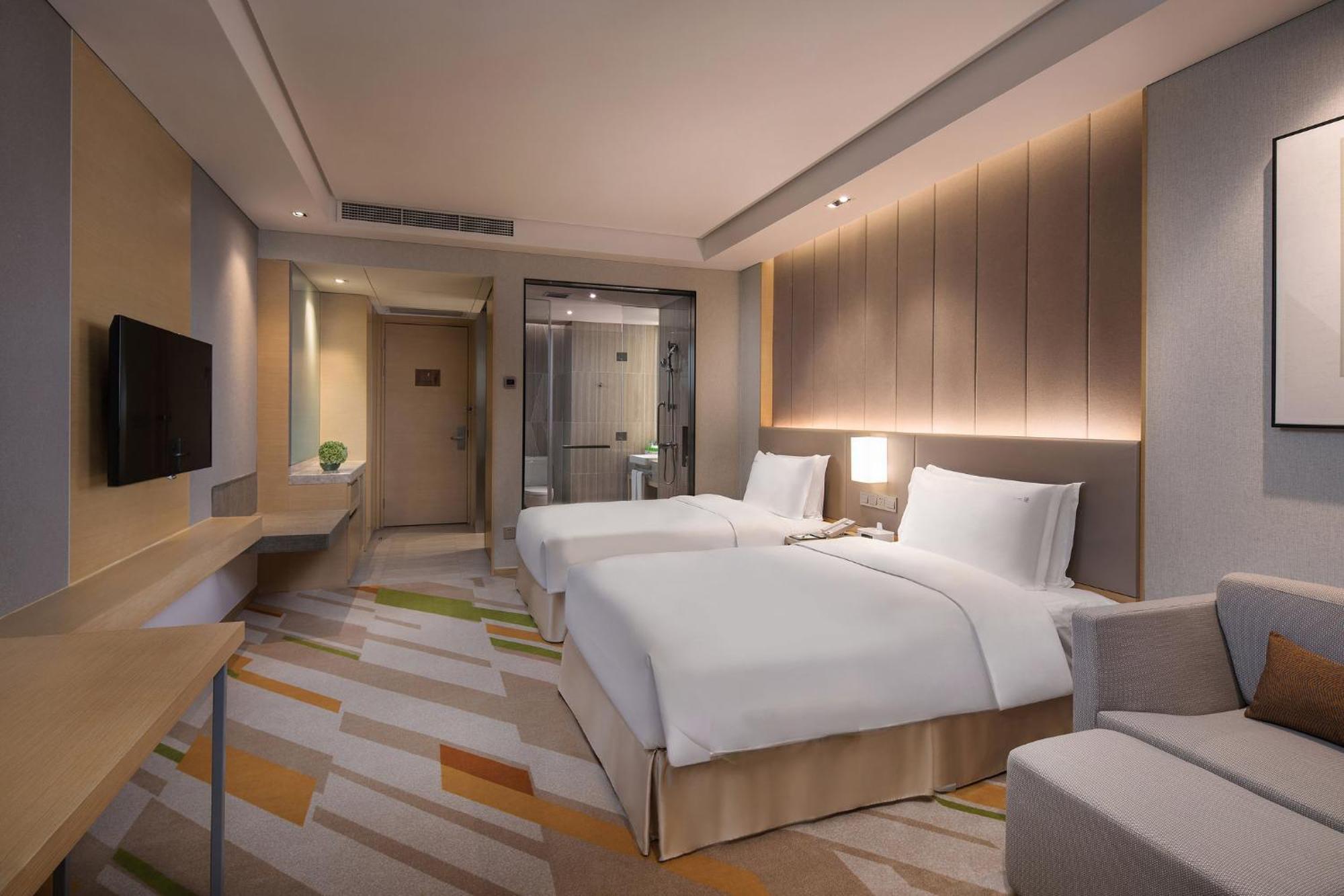Holiday Inn Wuxi Taihu New City By Ihg מראה חיצוני תמונה